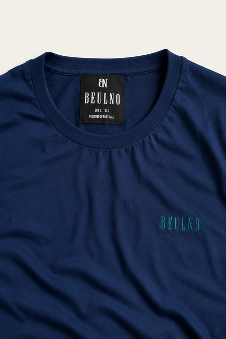 V-Neck Knit — Crest azul-marinho — detalhe da etiqueta interior